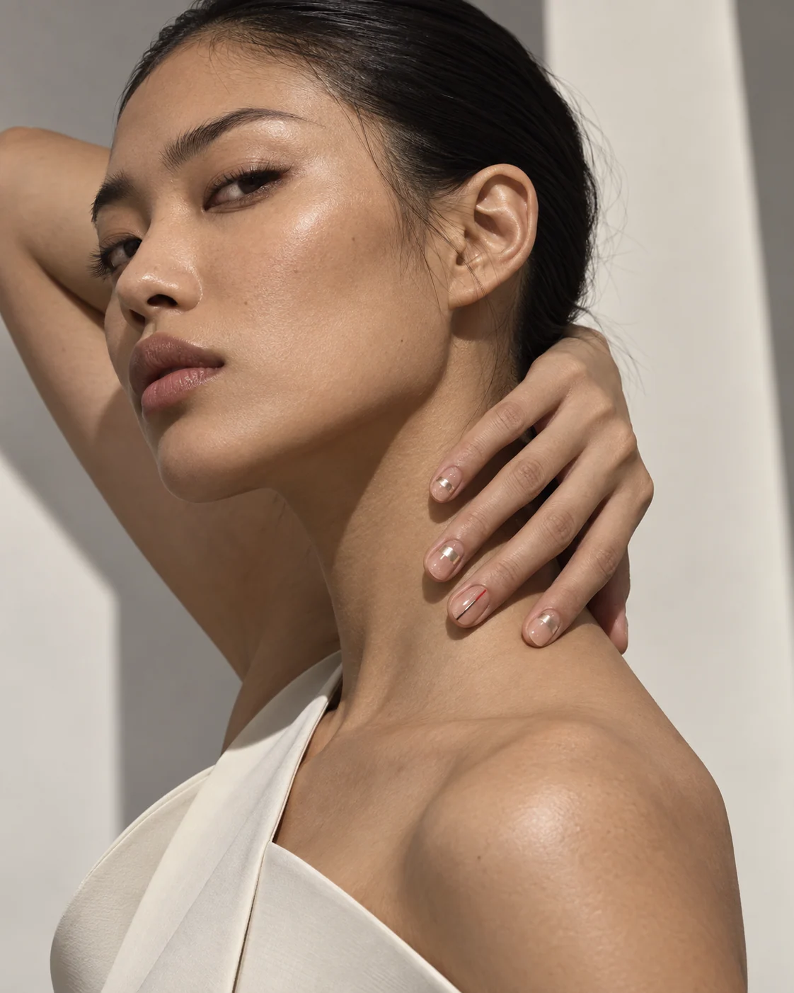 Asian fashion model presenting Fine Line handmade press-on nails